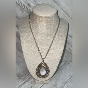 Gold and white pendant necklace